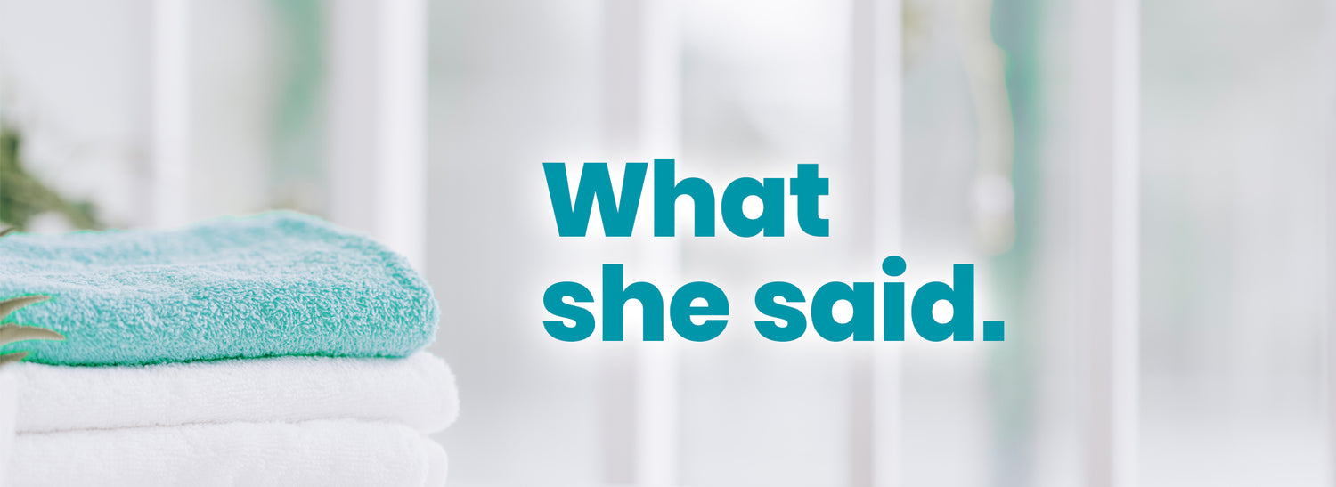 Banner image with folded towels and the text “What she said.”.